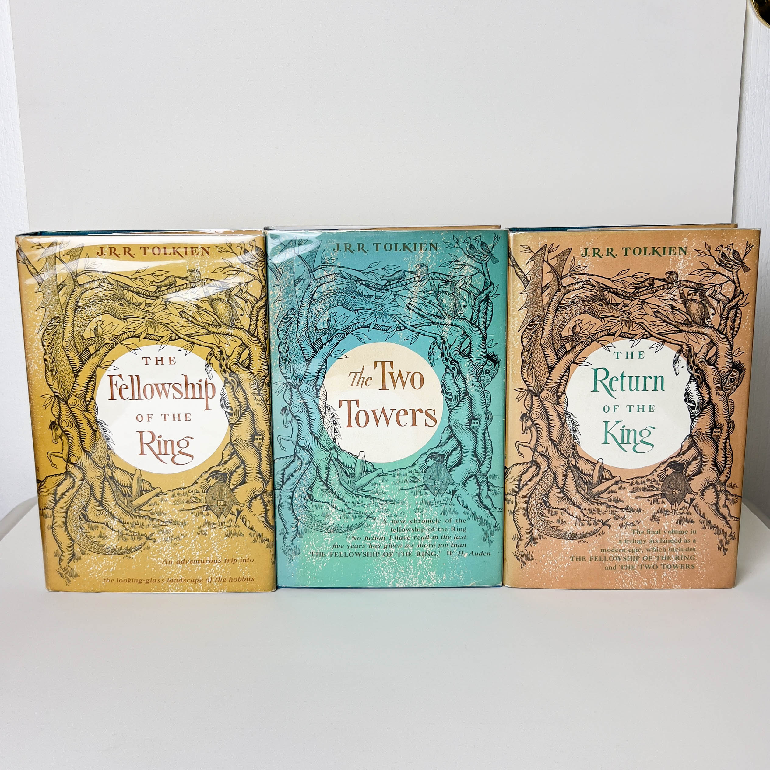 The Lord of the Rings, Comprised of the Fellowship of the Ring, the Two Towers, and the Return of the King, by J.R.R. Tolkien. Published by Houghton Mifflin in 1963 to 1965